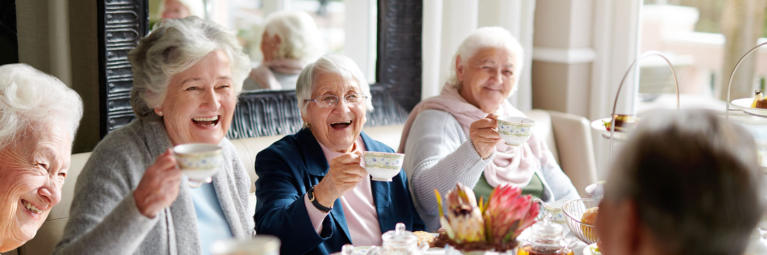 Cropped shot of a group of seniors having tea in their retirement home